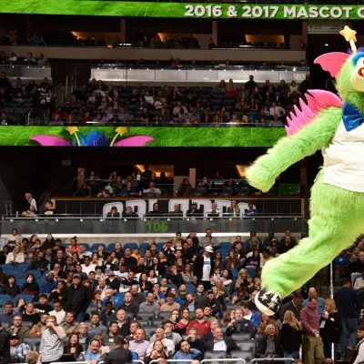 Orlando Magic's mascot Stuff jumps in the air to get the crowd excited