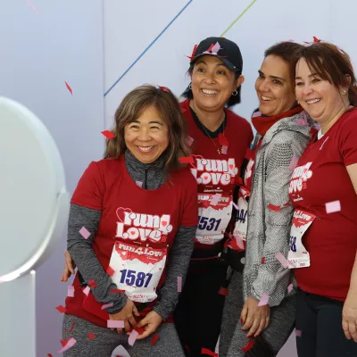 People at a Track Shack event in a photobooth.