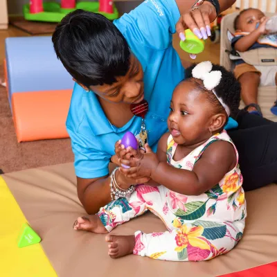 Teacher and student at the West Lakes Early Learning Center