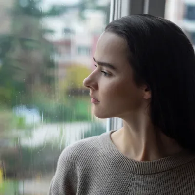 woman-looking-out-window