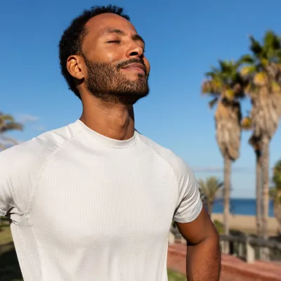 Adult Male breathng and smiling