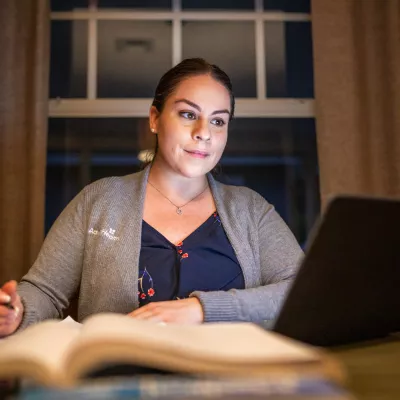 Woman Studying on a laptop