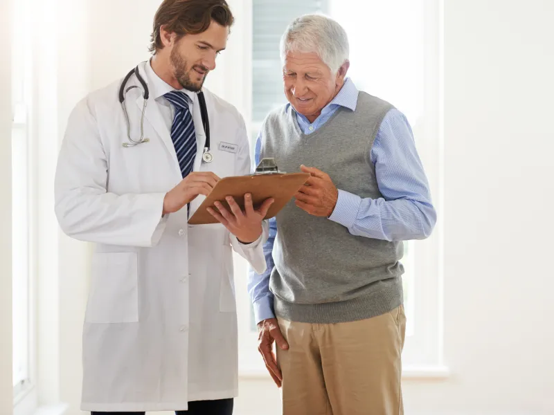 Older man visits the doctor for tests
