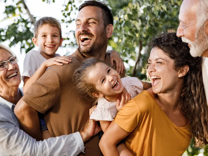 A Family Plays Together at an Outdoor Gathering
