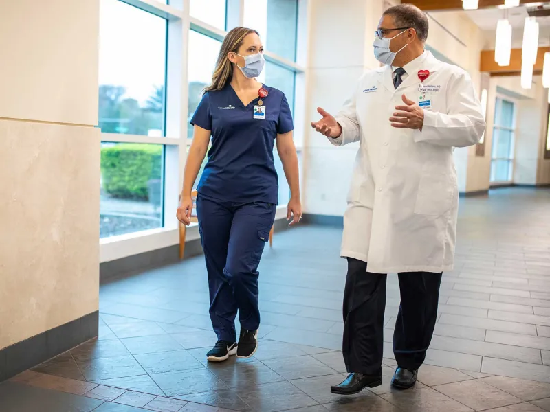 AdventHealth doctor and nurse having a conversation