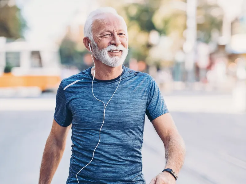 Physically-fit senior exercising in his local town.
