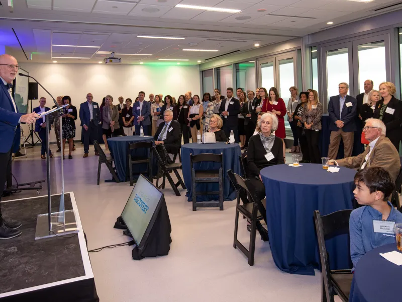 A crowd gathers for the TRI 10-year anniversary event