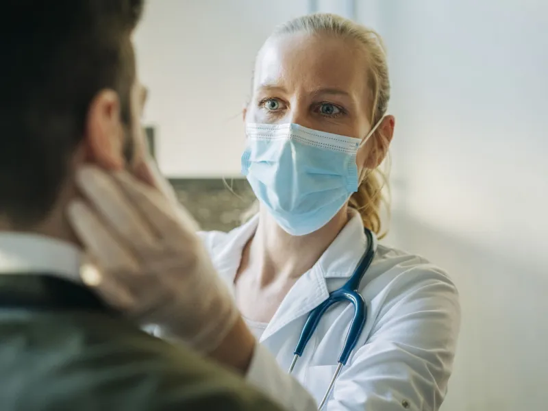 Female physician with patient