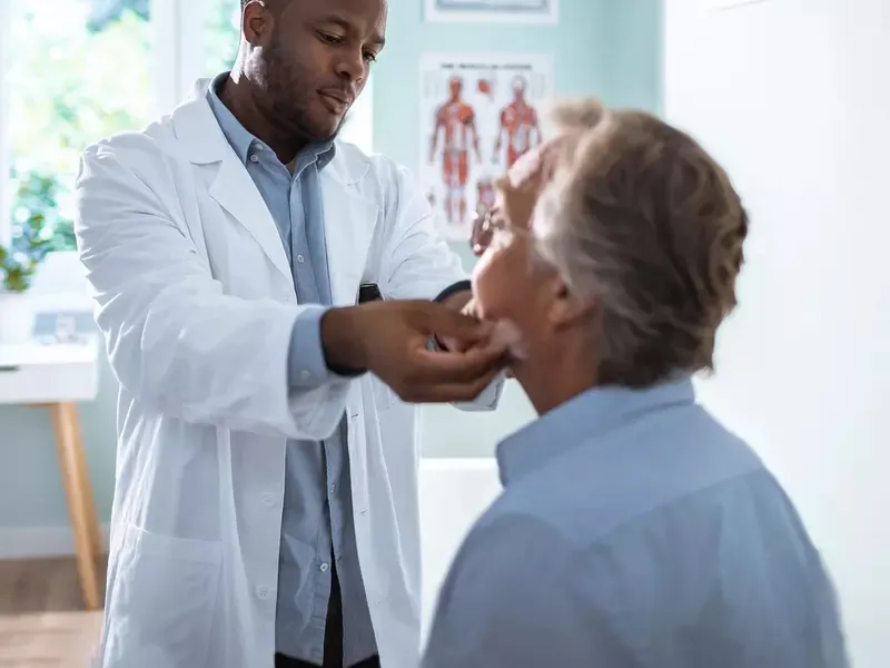 hero-doctor-with-male-patient