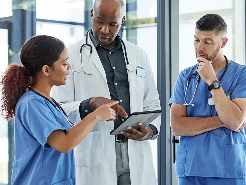 Doctors talking to nurses