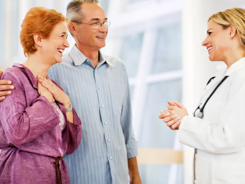 Mature Couple talking to their doctor