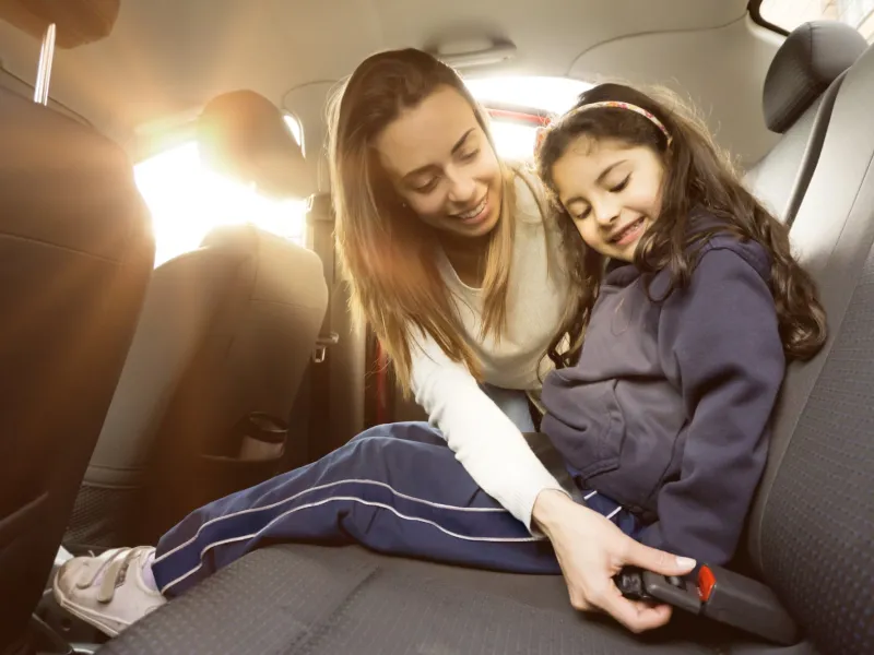 mother and daughter in car