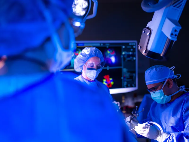 Surgery team performing neuro surgery.