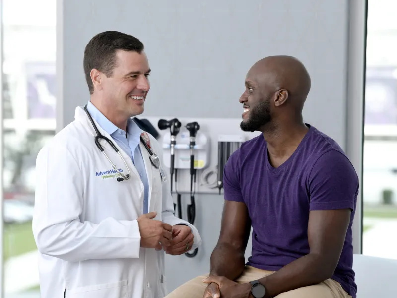 A Primary Care+ Physician Speaks with His Patient