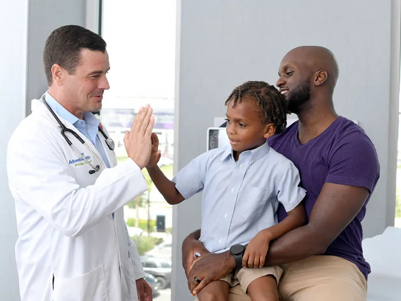 Provider with child and father