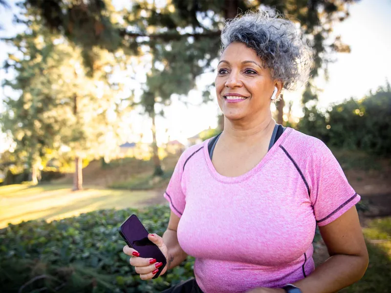 Senior Woman a little overweight pink shirt