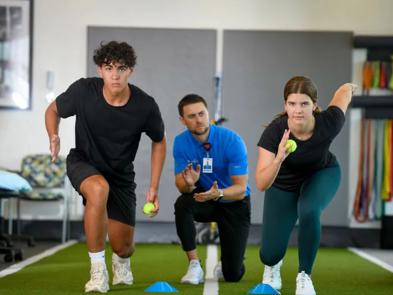 Sports Med and Rehab trainer and athletes 