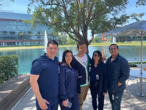 JohnPaul (JP) Bautista (middle) demonstrates the importance of creating relationships with his fellow colleagues throughout the TAP initiative and beyond. 