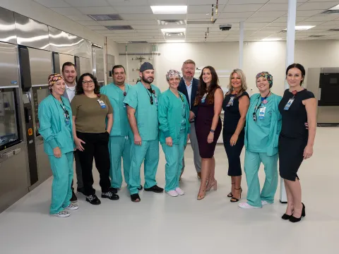 Group of physicians at the ribbon cutting of Wesley Chapel.