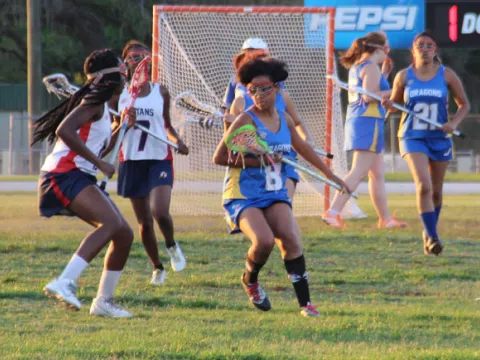 Students playing lacrosse