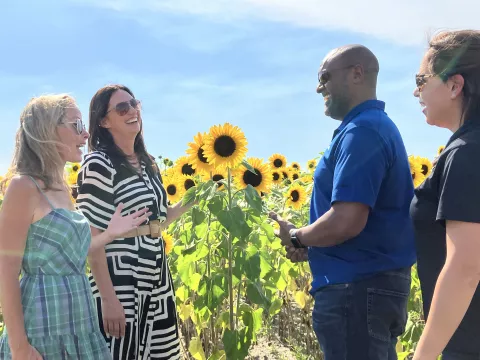 Amber Brooke Farms and AdventHealth Waterman leaders tour farm.