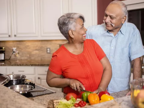 Couple cooking healthy meal