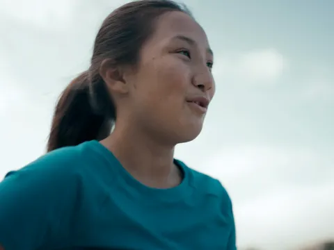 A Woman Jogging Outdoors