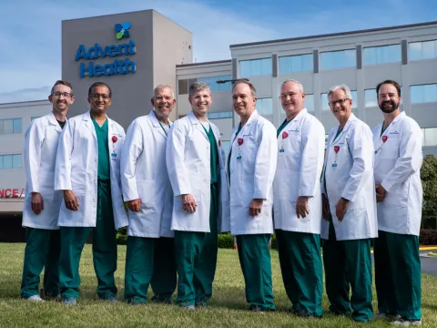 AdventHealth Medical Group Cardiology at Rome stand in front of AdventHealth Redmond