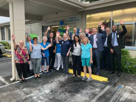 Volunteers and AdventHealth team members gather for 60 year celebration of Elite Repeat