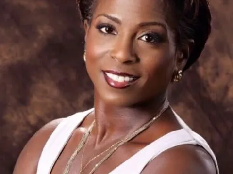 Woman with short hair posing for headshot