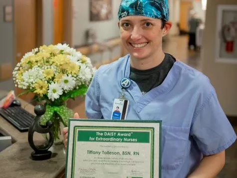 AdventHealth Hendersonville DAISY Award winner comforts COVID-19 patient after loss of wife.
