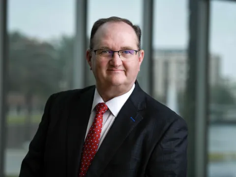 Todd Goodman, AdventHealth's new CFO, pictured outside an office building.
