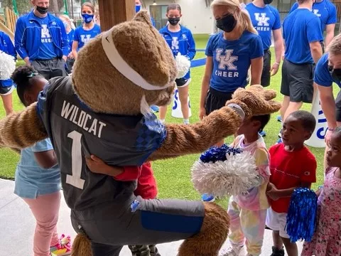 University of Kentucky Wildcat greets preschoolers at AdventHealth's West Lakes Early Learning Center in Orlando.