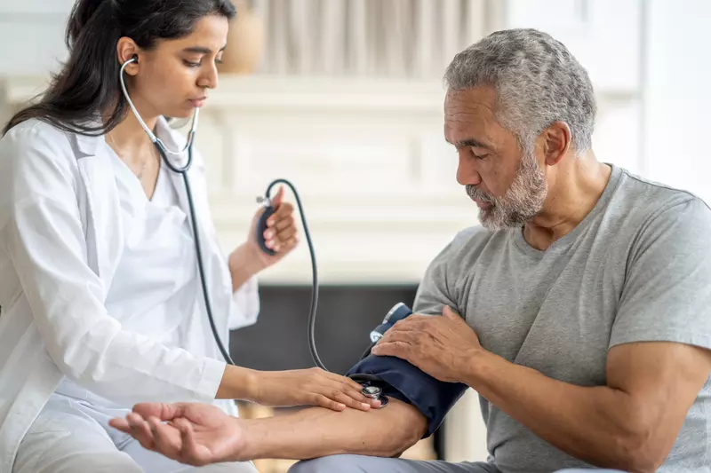 A Provider Checks a Patient's Blood Pressure
