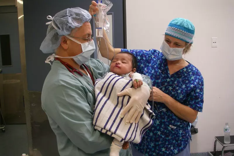 Picture of doctors taking care of a child