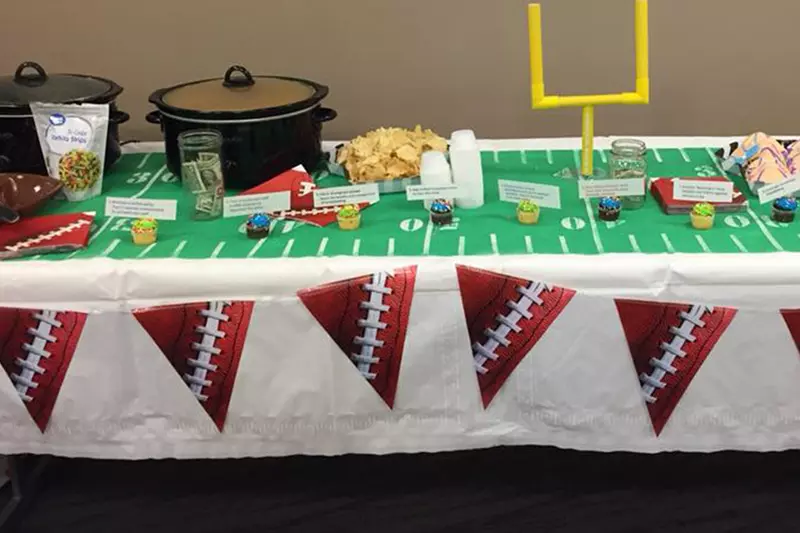 A table decorated with football theme.