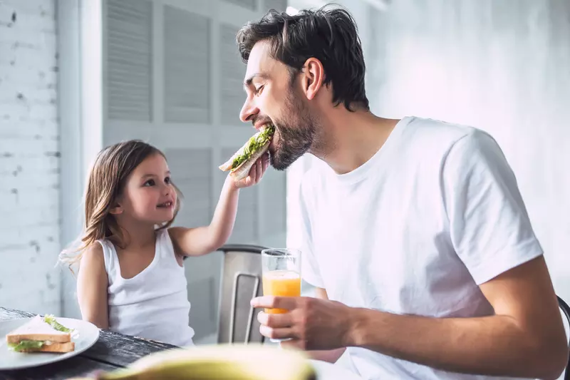 Father and Daughter Eating Healthy