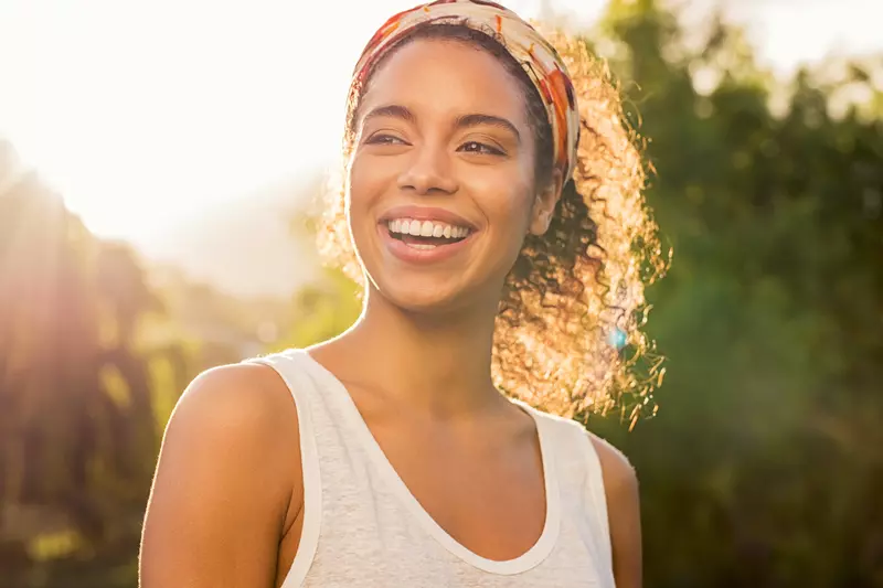 Smiling woman with a positive outlook.