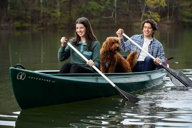 Couple and Dog in a Canoe 