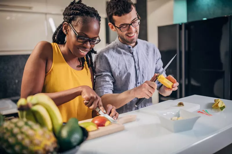 two adults prepare a health supper for diabetes
