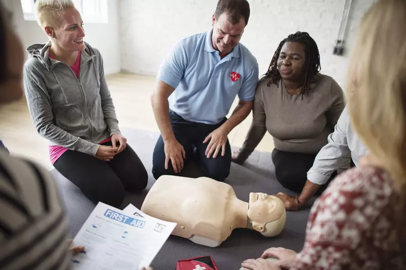 A group gets trained in CPR.