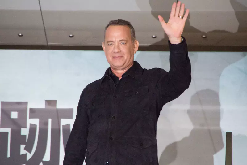 Tom Hanks waves to the crowd.