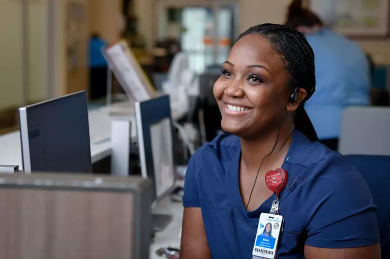 An AdventHealth Nurse smiling