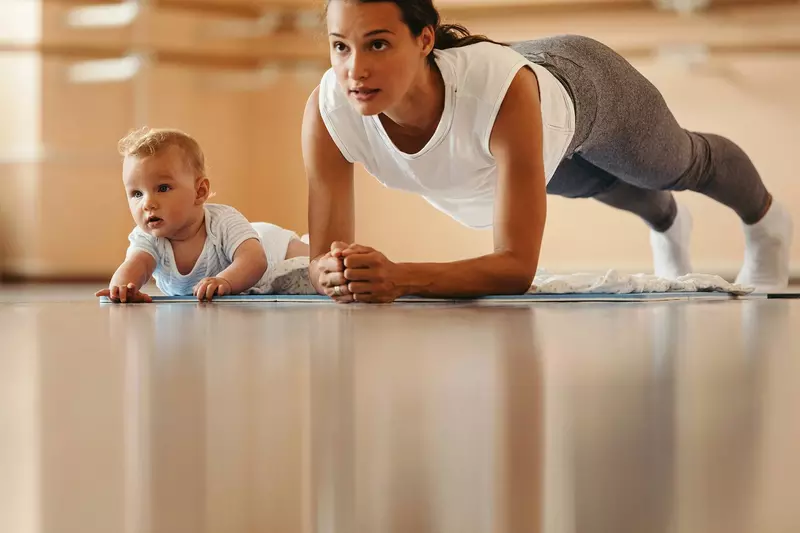 A mom doing a home workout.