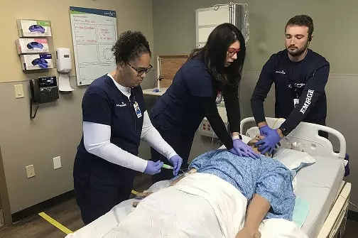 Nurses practicing a code blue event at simulation center in Palm Coast. 