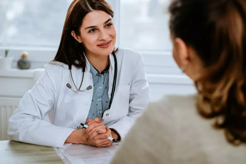 Woman talking to her doctor