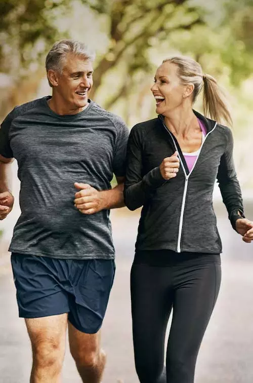 Man and woman jogging outdoors
