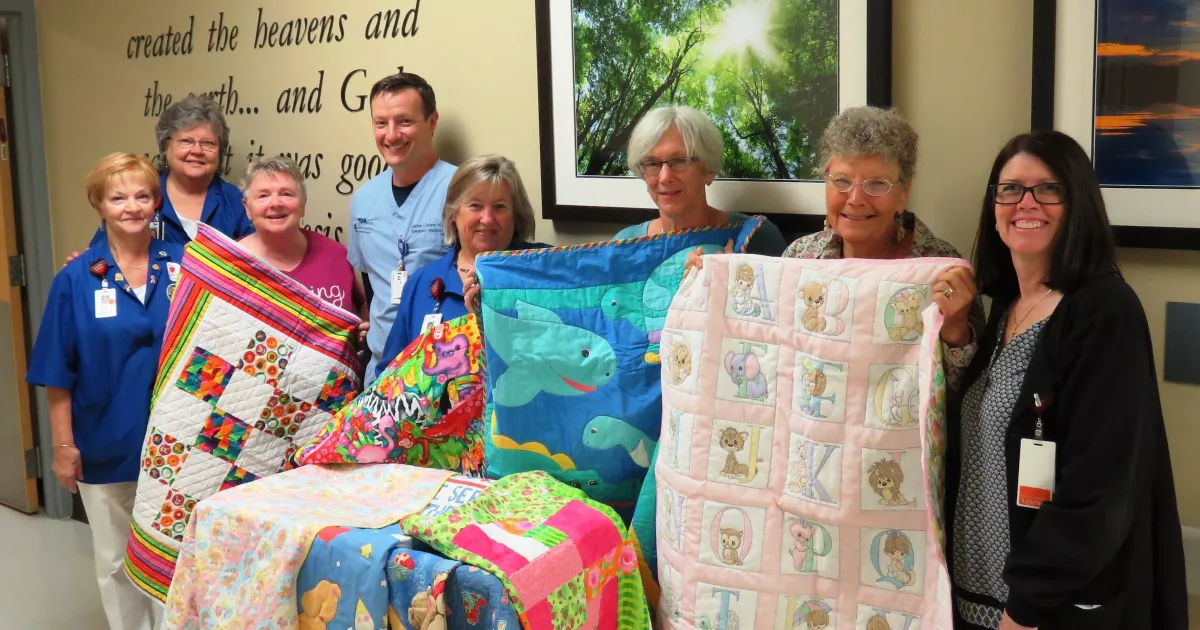 Local Quilters Donate 400th Quilt to Stuart F. Meyer Hospice House