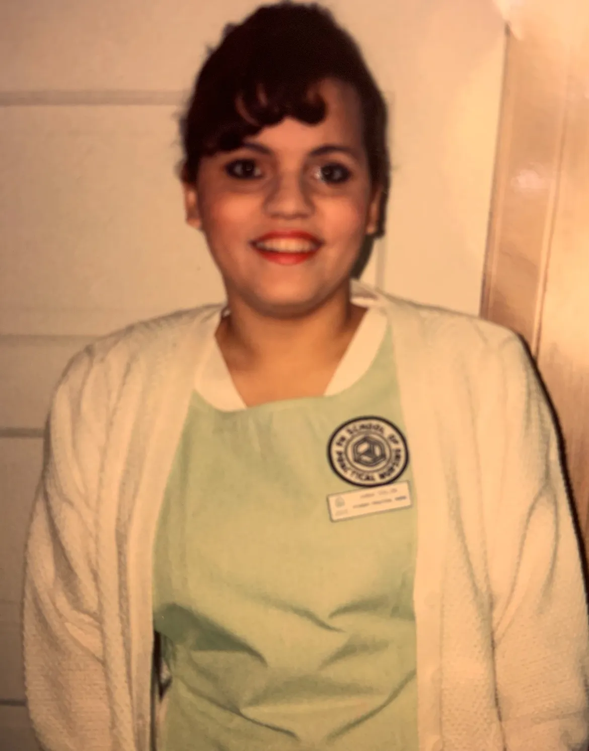 A photo of Anna Colon-Negron wearing her uniform as a nursing student