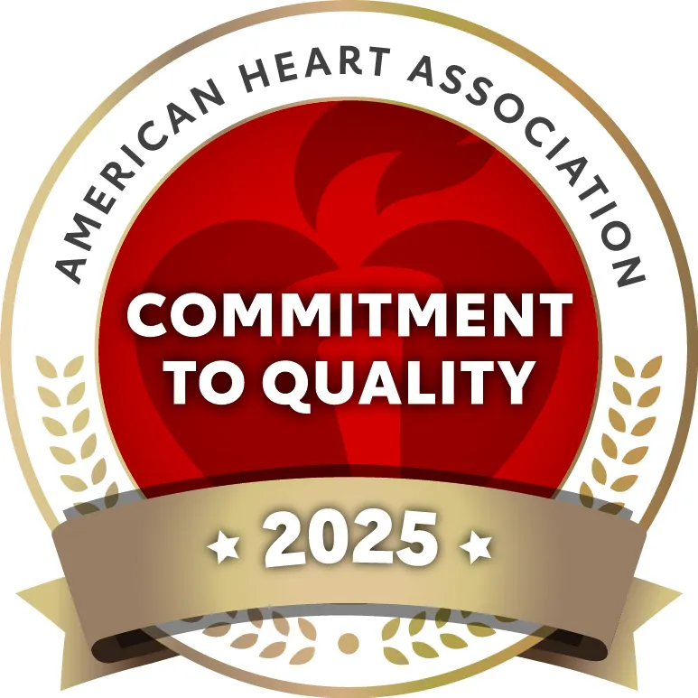 A red and gold badge that reads "American Heart Association: Commitment to Quality 2025"